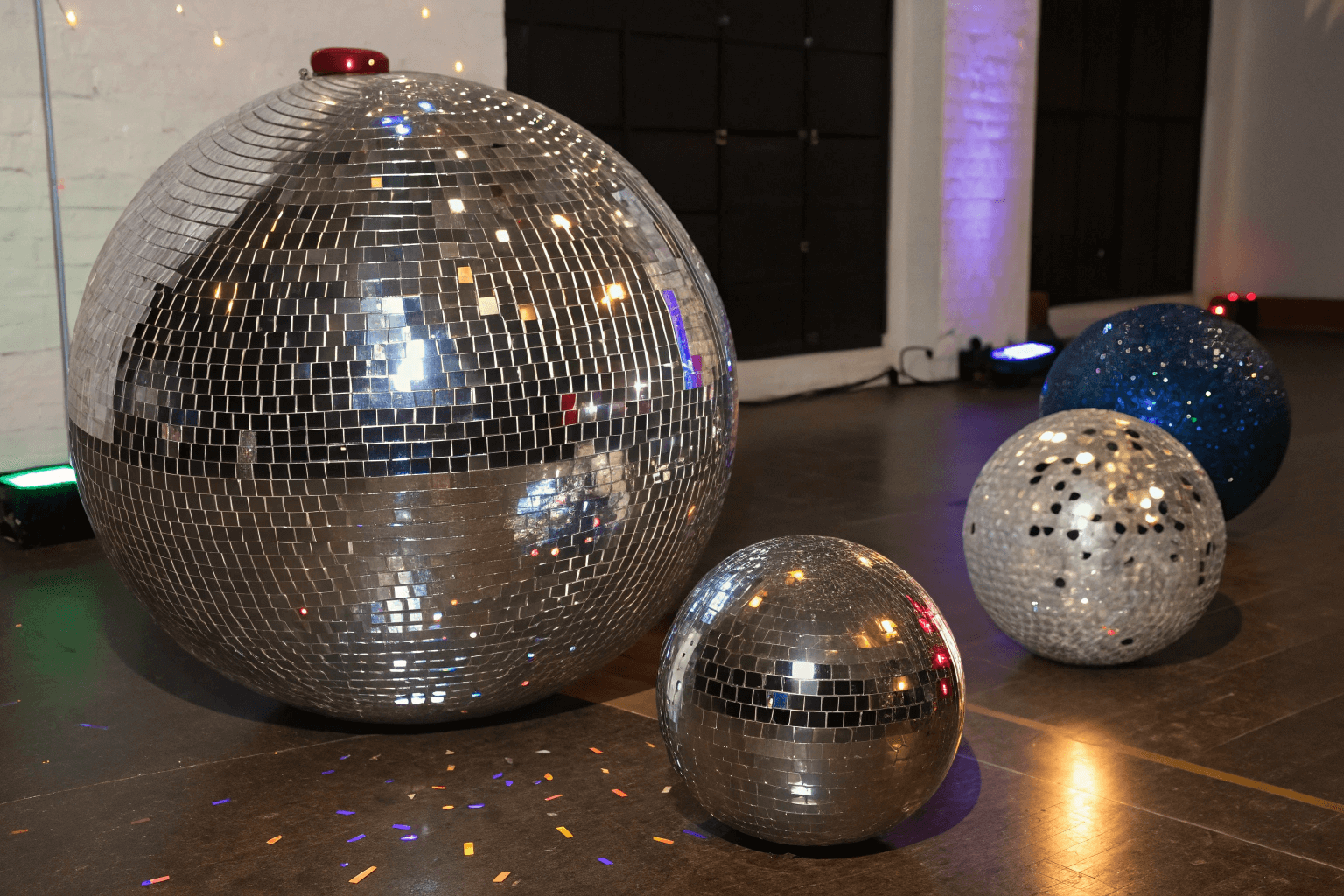 Assortment of professional silver and gold mirror balls in various sizes